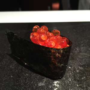 Ikura - salmon roe nigiri at Sushi Nakazawa in New York. - Julia Zhang