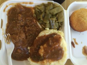 OLEAN'S SMOTHERED PORK CHOP